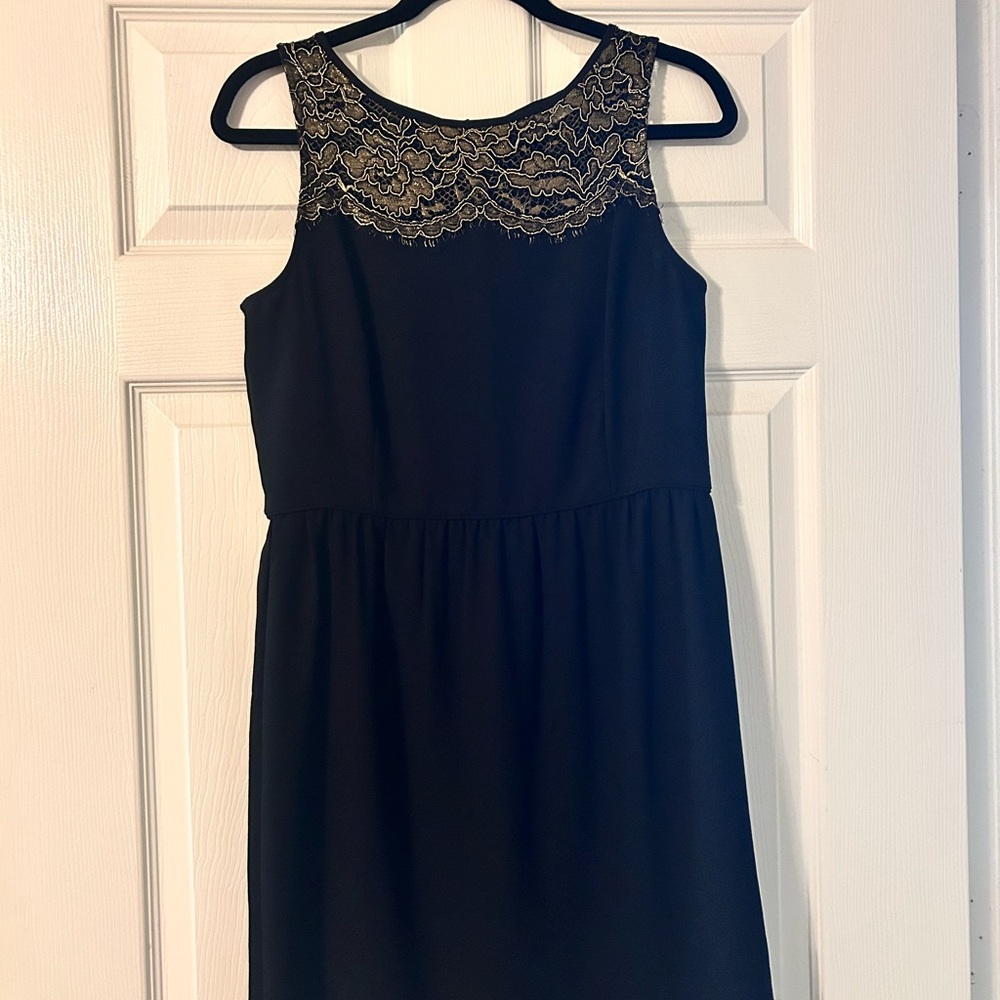 Elegant Black Dress with Gold Lace Detail